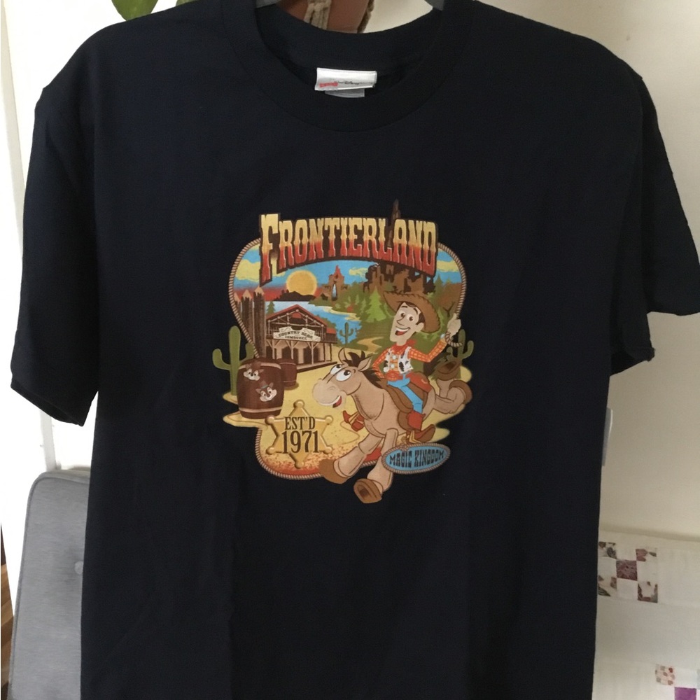 Brand new Disney World Frontierland shirt kids XL with Woody and Bullseye